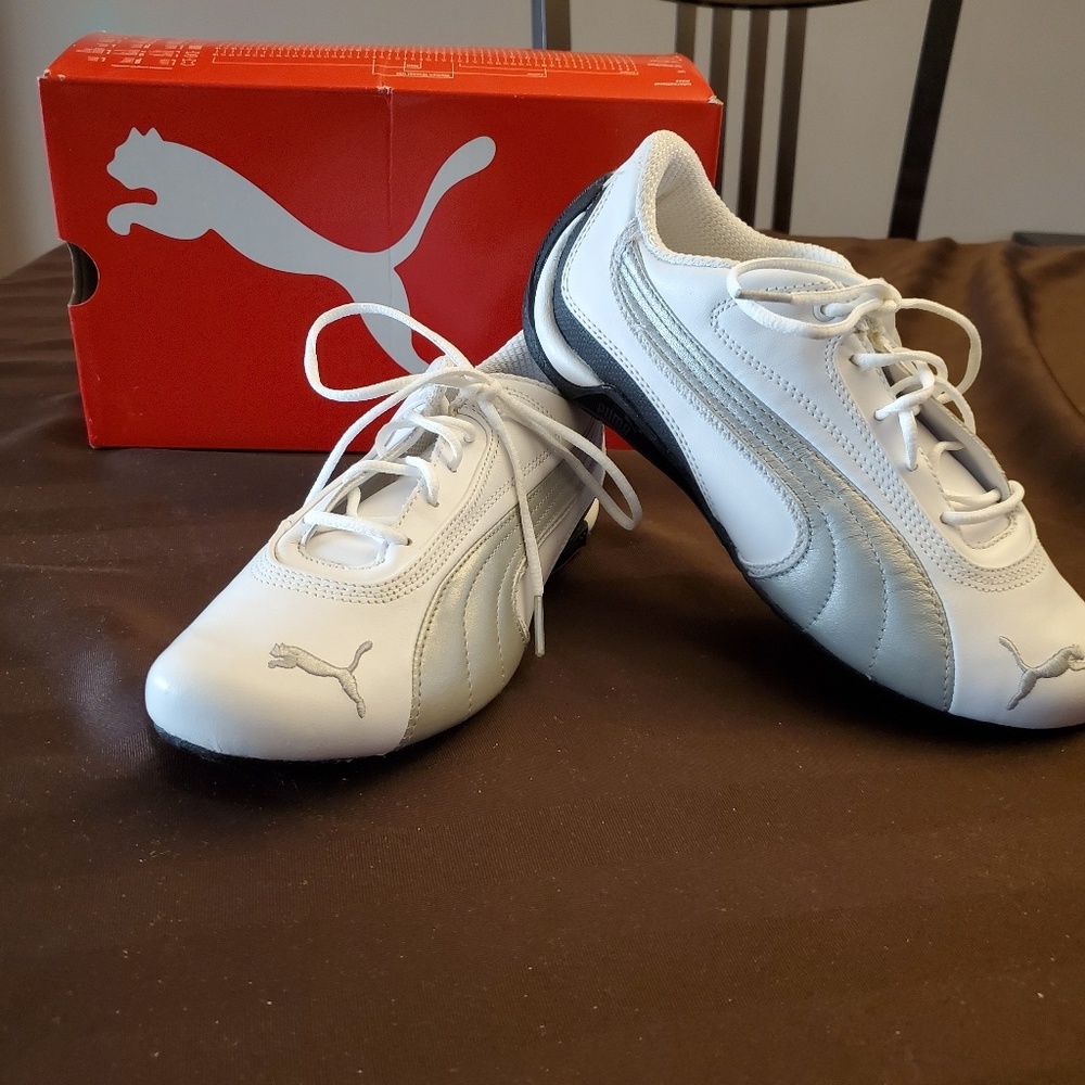 Brand new white and silver puma sneakers